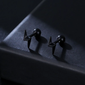 Minimalist black lightning bolt earrings in stainless steel with screw ball back closure