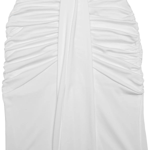 Close-up of the white elastic fabric with detailed pleated ruching design on the dress