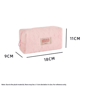 Pink plush cosmetic bag with HISOCUTE label showing dimensions 18x9x11cm in detail