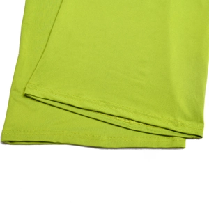 Detail of lime green stretch knit fabric showing hem stitching and textile texture