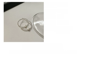 Detail view of S925 silver beaded hoop earrings with pearls showing 28.6mm size