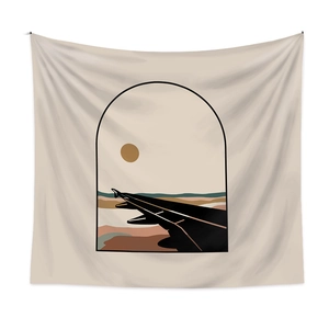 Detail of bohemian tapestry featuring abstract sun and geometric landscape art on fabric