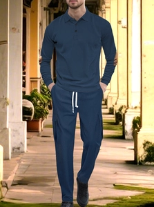 Detail of navy blue long sleeve polo set for men with premium vertical ribbed knit texture