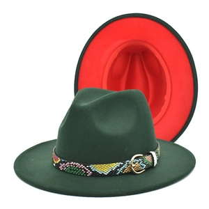 Deep green fedora hat with red lining and colorful snakeskin band on white background