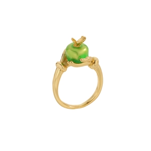 Creative gold ring featuring a hand design holding a green apple with zircon stones