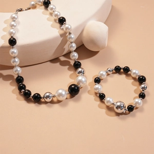 Irregular pearl and glass beaded necklace and bracelet set in black white and silver