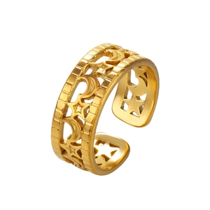 18k gold plated stainless steel open ring featuring cutout star and moon celestial patterns