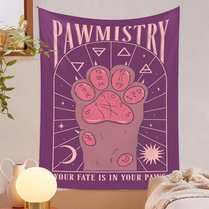 Macro detail of purple tapestry showing pawmistry cat paw design and mystic symbols
