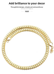 Close-up of a polished gold-plated stainless steel flat Cuban link chain with lobster clasp