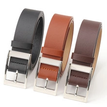 Three minimalist leather belts in black and brown shades with silver metal buckles