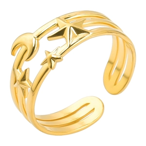 Macro detail of gold open ring featuring hollow star and moon patterns with metallic finish