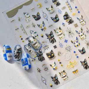 Detailed Egyptian cat nail art stickers featuring golden pyramid and eye of Horus patterns