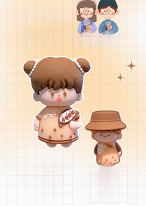 Close-up of cute cartoon bubble tea couple keychains with 3D miniature figurines