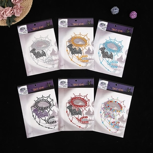 Set of 6 Halloween face gem stickers featuring bat and spider web rhinestone designs
