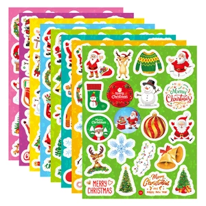 Detailed fan-shaped stack of colorful waterproof Christmas stickers with festive patterns