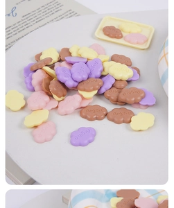 Macro shot of 2cm colorful resin cloud charms for DIY slime and crafts decoration