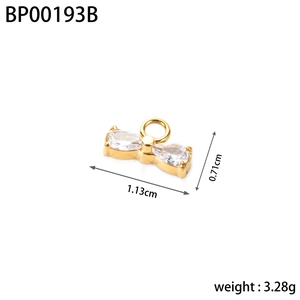 Golden stainless steel bow pendant with white teardrop stones and measurements