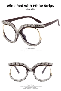 Detail of burgundy oversized eyeglass frames with sparkling rhinestones and gold accents