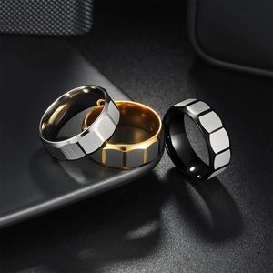 Faceted square stainless steel rings in gold silver and black with brushed texture
