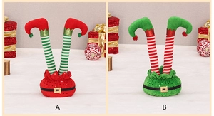 Detail view of red and green striped Christmas elf legs decorations with sequined bases