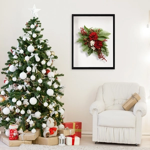3D Christmas wall art with poinsettia and pine needles in a black frame for home decor