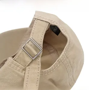 Detail view of cotton baseball cap with adjustable stainless steel metal buckle