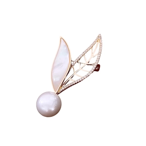 14K gold plated brooch with pearl and sparkling crystal leaves on a white background
