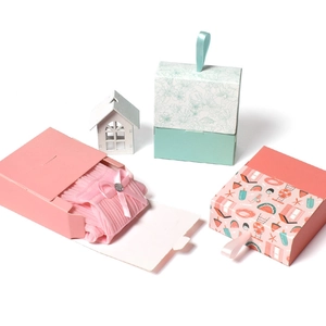Mini floral and pink gift boxes set featuring folding handle and decorative socks