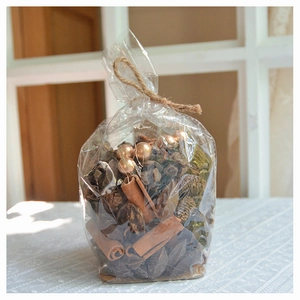 Christmas pine cone and cinnamon stick DIY decor pack in natural gift bag with jute twine