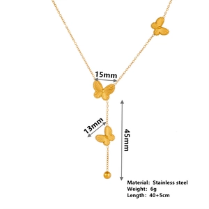 Detailed view of golden stainless steel butterfly necklace with dimensions and 45mm tassels