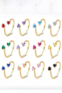 Showcase of 12 birthstone rings with double heart-shaped zircons and gold-plated open bands