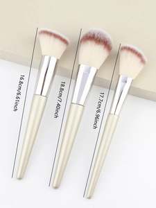 Detailed view of 3 champagne makeup brushes with precise length measurements in cm and inch