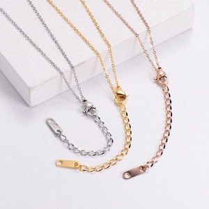 Detailed view of 18KGP lobster clasp and extension chains in silver, gold, and rose gold