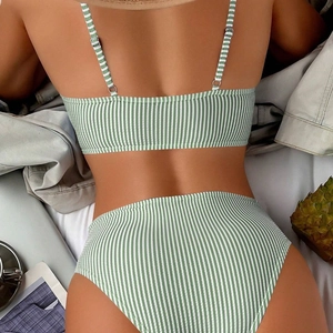 Detailed back view of green and white striped high-waisted bikini with ribbed texture