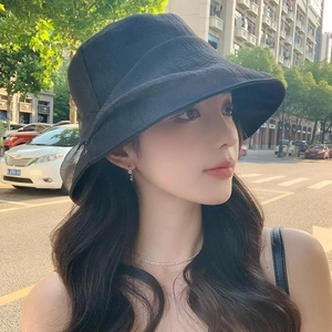 Chic black pleated tulle bucket hat for women offering stylish outdoor sun protection