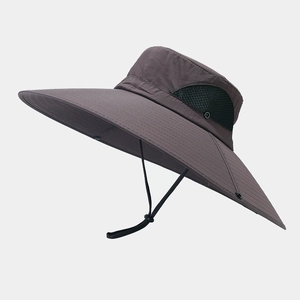 Detail of outdoor sun hat featuring breathable mesh side panels and adjustable chin strap