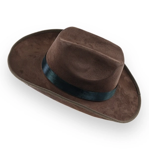 Close-up of brown suede cowboy hat with black ribbon band and curved brim detail