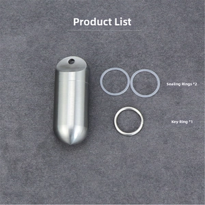 Detail view of titanium waterproof capsule container with spare O-rings and keyring