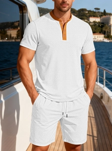 Men's summer white knit set with brown collar trim on a yacht deck background