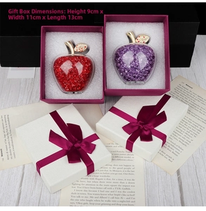 Detailed view of rhinestone apple ornaments with elegant purple gift box dimensions