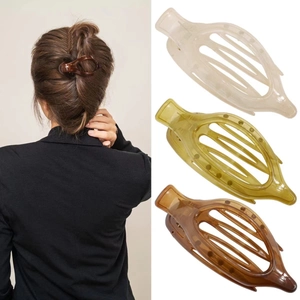 Oval duckbill hair clips in beige, yellow-green, and brown for women's updos