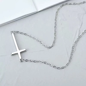 Minimalist silver-plated necklace featuring a horizontal cross pendant on a short chain