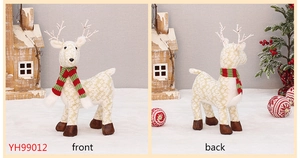 Front and back views of a plush Christmas reindeer ornament with snowflake patterns