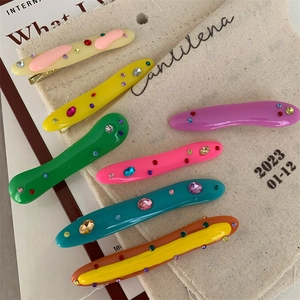 Set of colorful irregular acrylic hair clips with rhinestones in various vibrant colors
