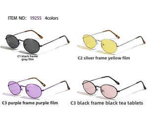 Vista detallada de cuatro gafas de sol ovaladas con patillas metálicas en varios colores retro