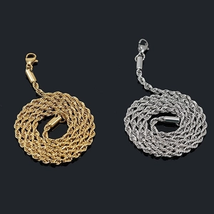 Polished gold and silver twisted stainless steel chains with lobster clasps on black