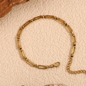Detail of 14K gold plated paperclip chain anklet with lobster clasp and extender