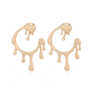 Fashionable golden earrings with liquid melt drop design on a clean white background