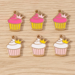 Detailed macro view of colorful enamel crown cupcake alloy charms for DIY jewelry making