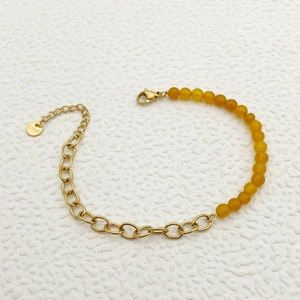 Elegant gold stainless steel chain bracelet with yellow faceted crystal beads